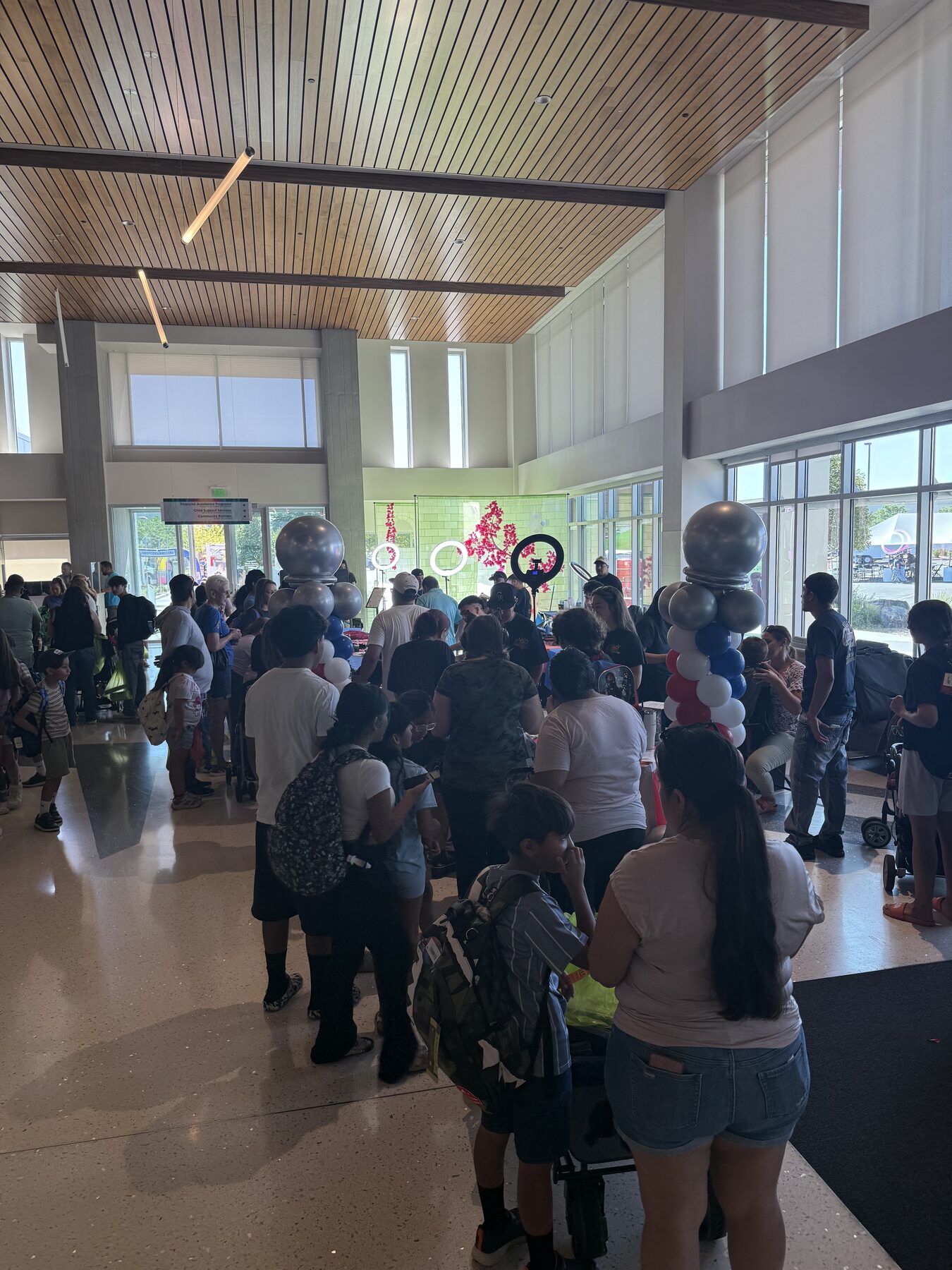 Families gathered inside the Adams County back-to-school event
